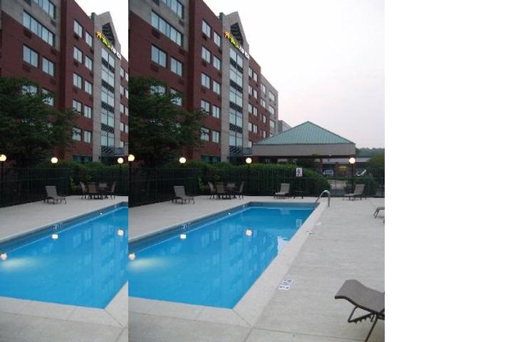 Elimwood Hotel a Ramada by Wyndham photo collage