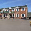 Photo of Guest House Inn & Suites