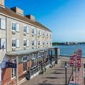 Exterior of Harbor House Hotel and Marina at Pier 21