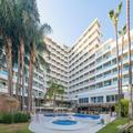 Exterior of Hotel Parasol by Dorobe