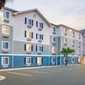 Exterior of Woodspring Suites Brownsville