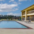 Swimming pool at Days Inn & Suites by Wyndham Huntsville