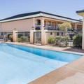Swimming pool at Days Inn by Wyndham Macon I 475
