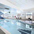 Swimming pool at Holiday Inn Express Airport-Calgary by IHG
