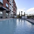Swimming pool at Holiday Inn Express & Suites Orlando Southeast An Ihg Hotel