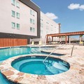 Swimming pool at La Quinta Inn & Suites by Wyndham Mcallen Convention Center
