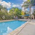 Swimming pool at La Quinta Inn & Suites by Wyndham Modesto Salida
