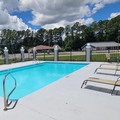 Swimming pool at Microtel Inn & Suites by Wyndham Camp Lejeune Jacksonville