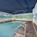 Swimming pool at Tropical Winds Oceanfront Hotel