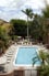 Relax Beside Our Heated Outdoor Pool 1 of 5