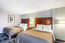 Deluxe 2 Queen Guest Room 1 of 7