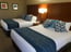 Standard Guestroom With Two Queen Beds 1 of 12