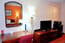King Room With Tv Refrigerator Microwave & Desk 31 of 31